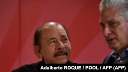 De izquierda a derecha, Daniel Ortega y Miguel Díaz Canel. (AFP/Adalberto Roque).