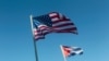 Banderas de Estados Unidos y Cuba. (Reuters).