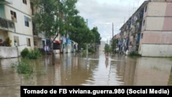 "El agua nos daba a la cintura y ya da por las rodillas", declaraciones de un poblador de la Comunidad Grito de Yara, Río Cauto, Cuba.